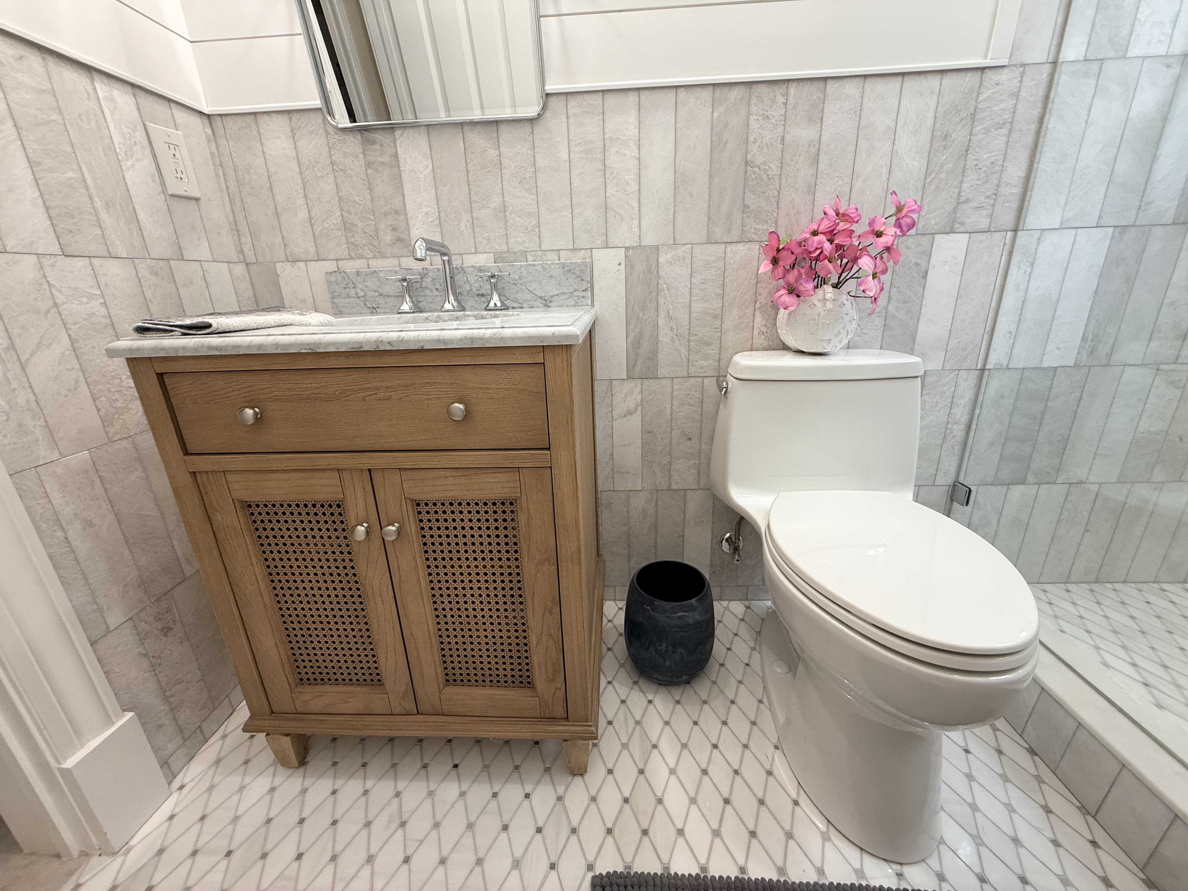 Powder room with gray stone-plank wall tile and diamond mosaic floor, Largo FL